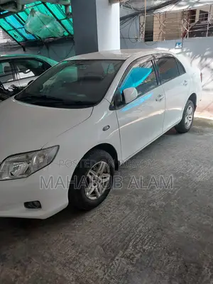 টয়োটা অ্যাক্সিও ২০০৯ সাদা