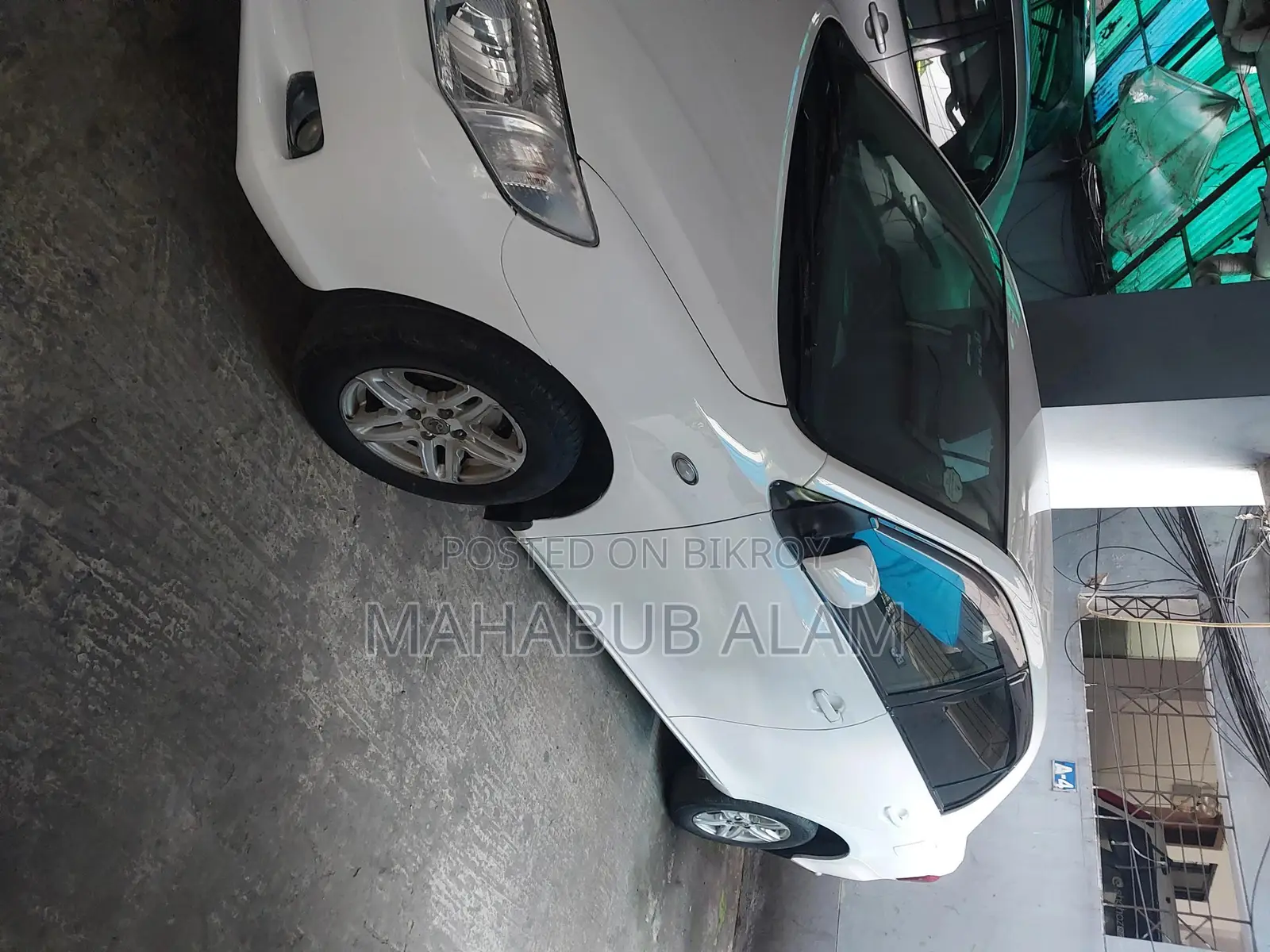 টয়োটা অ্যাক্সিও ২০০৯ সাদা
