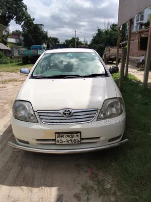 টয়োটা করোল্লা সেডান ২০০৩ সাদা