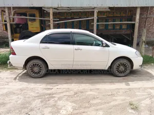 টয়োটা করোল্লা সেডান ২০০৩ সাদা