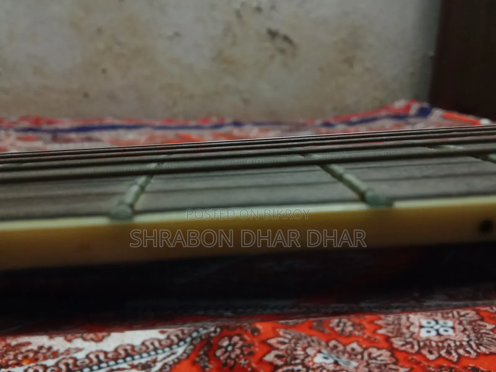 TMG গিটার ।