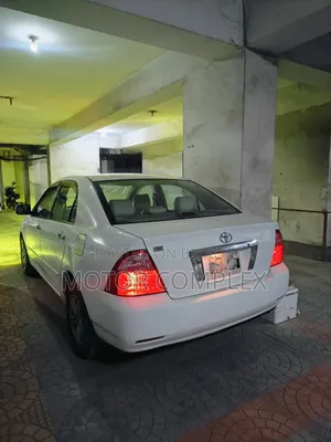 টয়োটা করোল্লা ২০০৬ সাদা