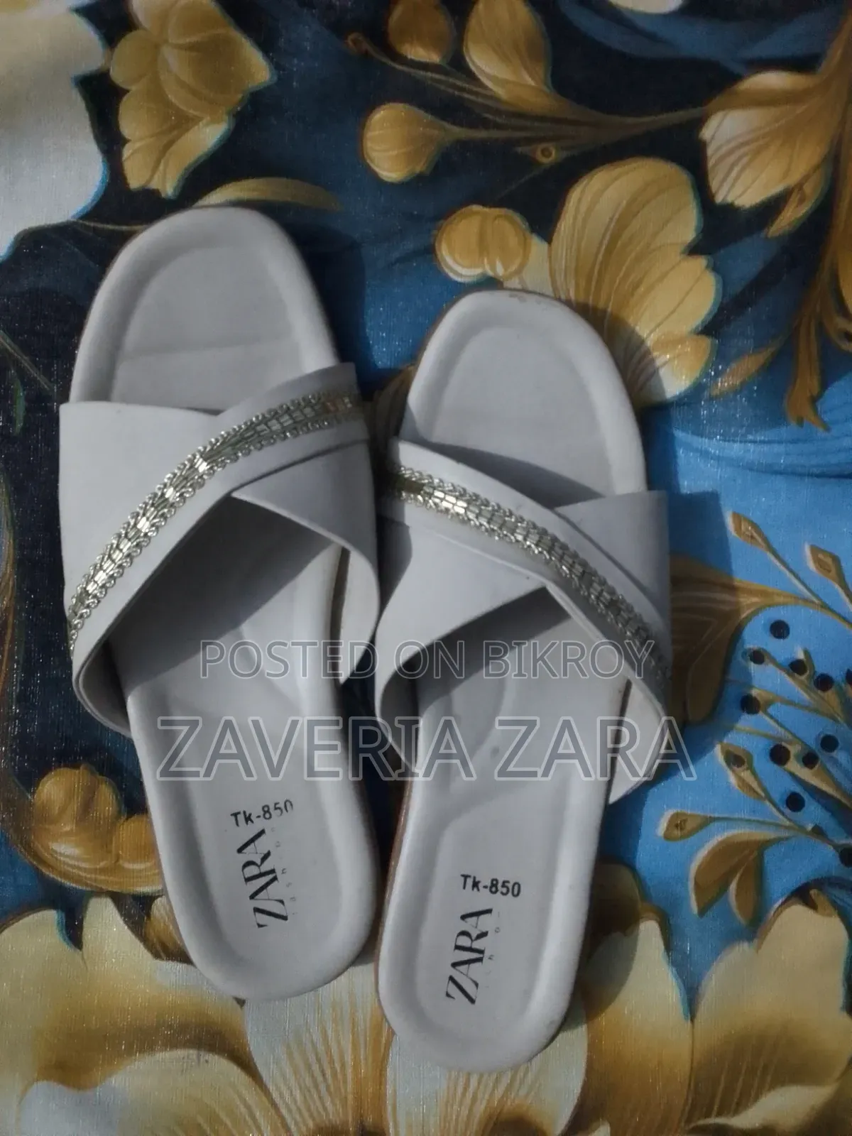 Size: 39. Selling because I am not used to wearing slippers.