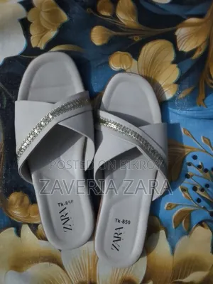 Size: 39. Selling because I am not used to wearing slippers.