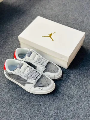 • Jordan 1 Low Travis Scott X Stüssy "Grey White Red"