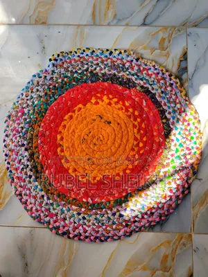 Beautiful colorful doormat made from old clothes