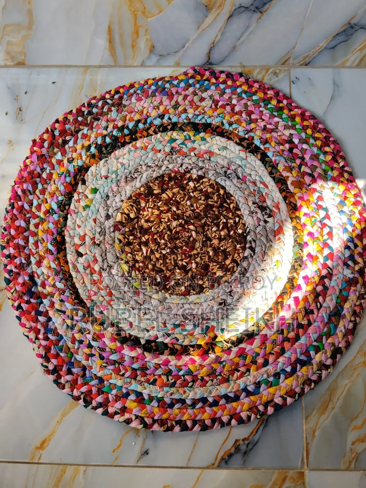 Beautiful colorful doormat made from old clothes