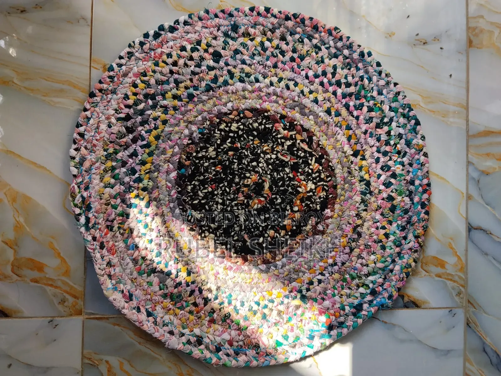 Beautiful colorful doormat made from old clothes