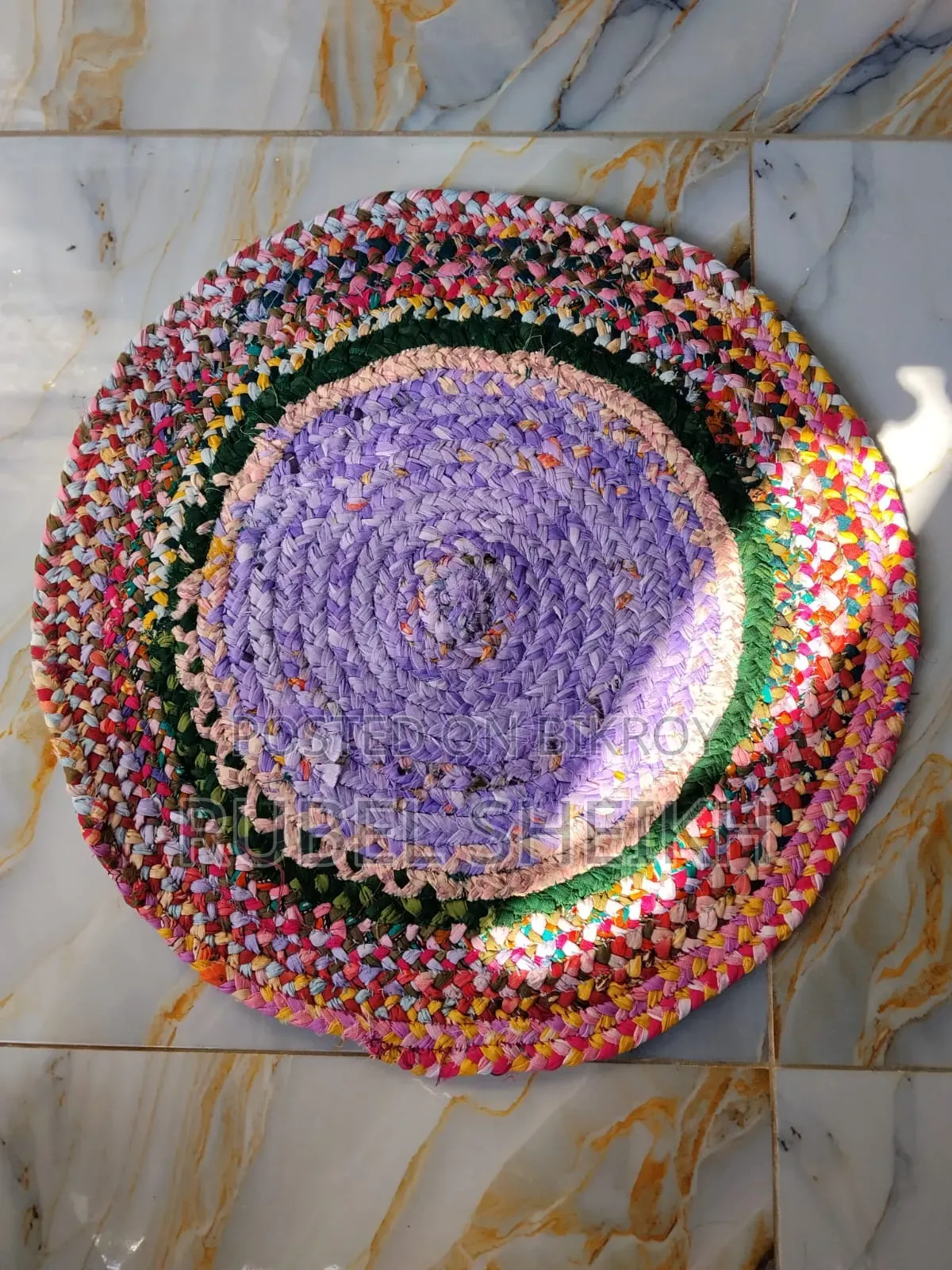 Beautiful colorful doormat made from old clothes