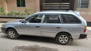 টয়োটা করোল্লা স্টেশন ওয়াগন ২০০২ সিলভার