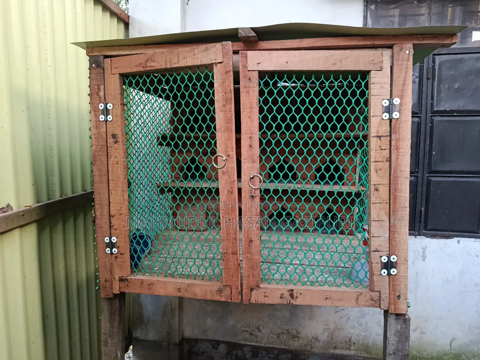 Wooden pigeon loft with 12 doors for sale.
