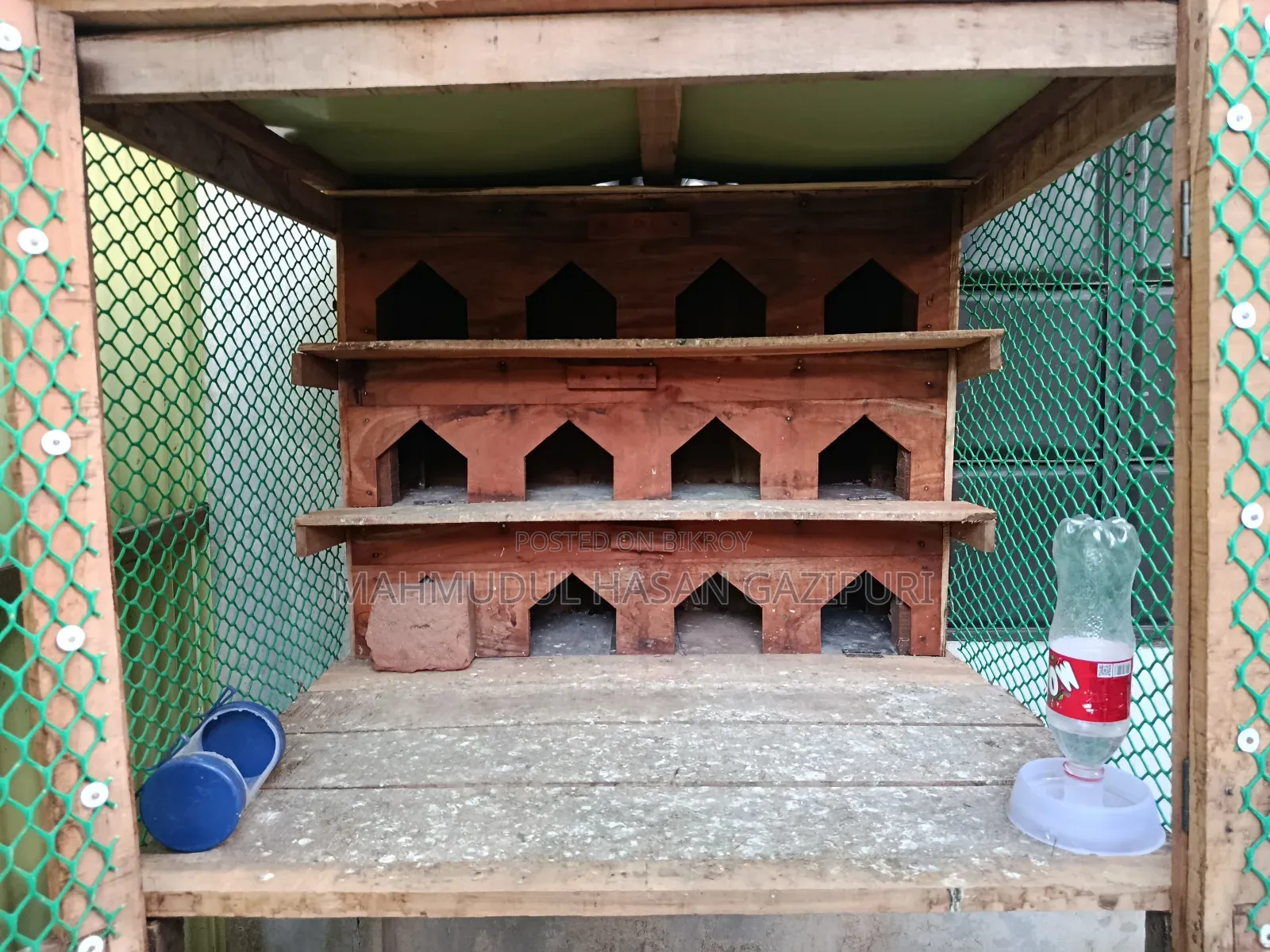 Wooden pigeon loft with 12 doors for sale.