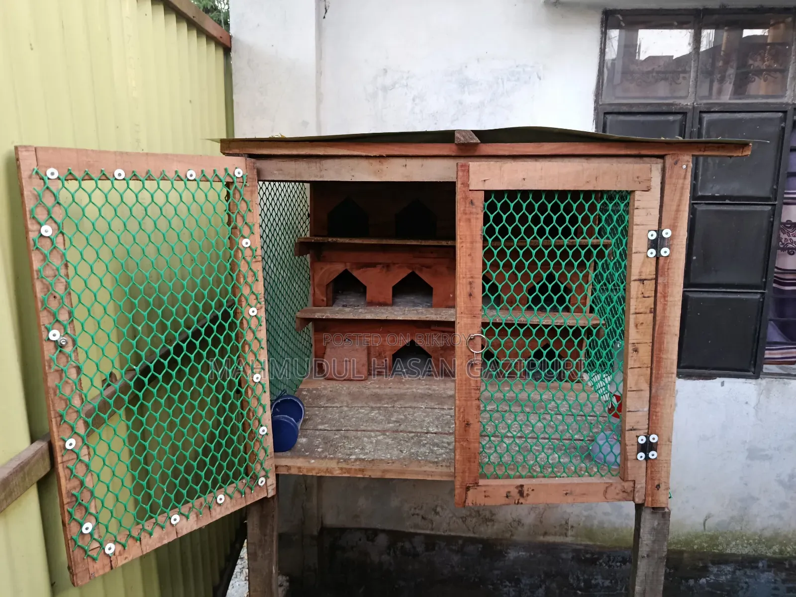 Wooden pigeon loft with 12 doors for sale.