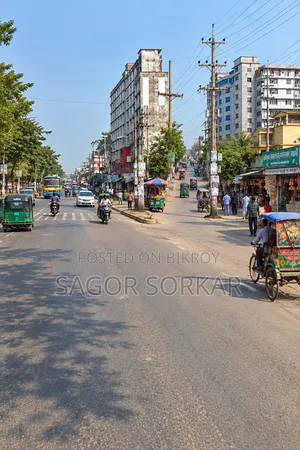 Land with market for sale near garments, rental income