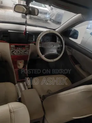 টয়োটা করোল্লা সেডান ২০০৫ সাদা