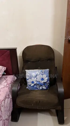 An old wooden frame chair will be sold