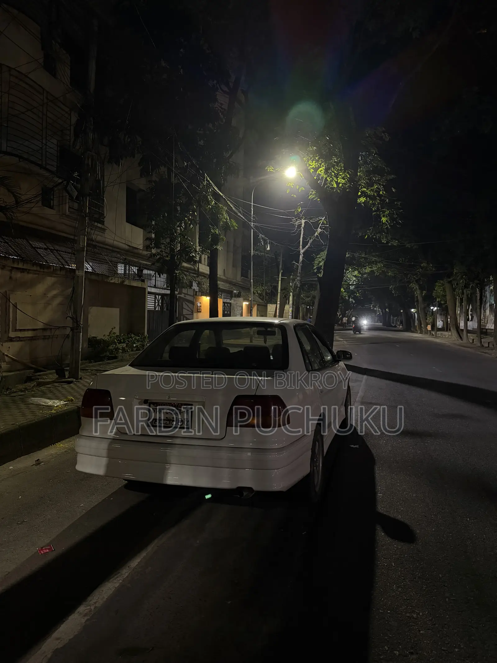 টয়োটা করোল্লা সেডান ১৯৯৯ সাদা
