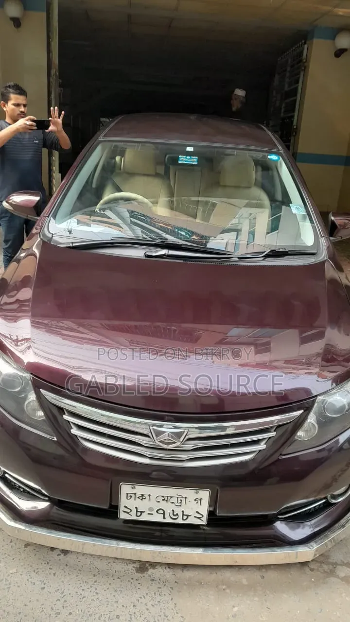 টয়োটা অ্যালিওন ২০১৩ মেরুন