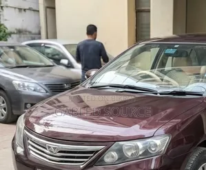 টয়োটা অ্যালিওন ২০১৩ মেরুন