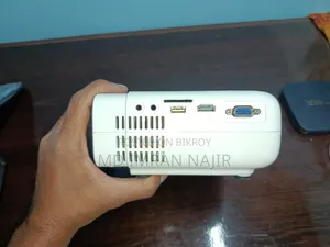 Projector and Android TV card for sale due to urgent need of money