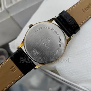 Titan Unisex Quartz Analog Watch. 35 Mm | Day-Date Function