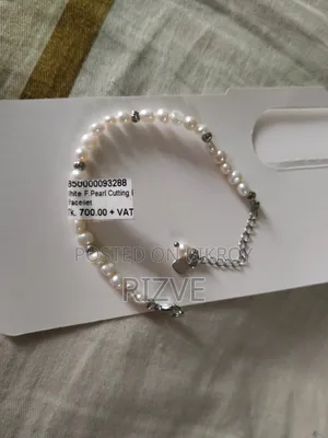 White F. Pearl Cutting Bracelet