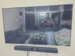 Media TV, IJoy Sound System and Media Console (Table Under TV)