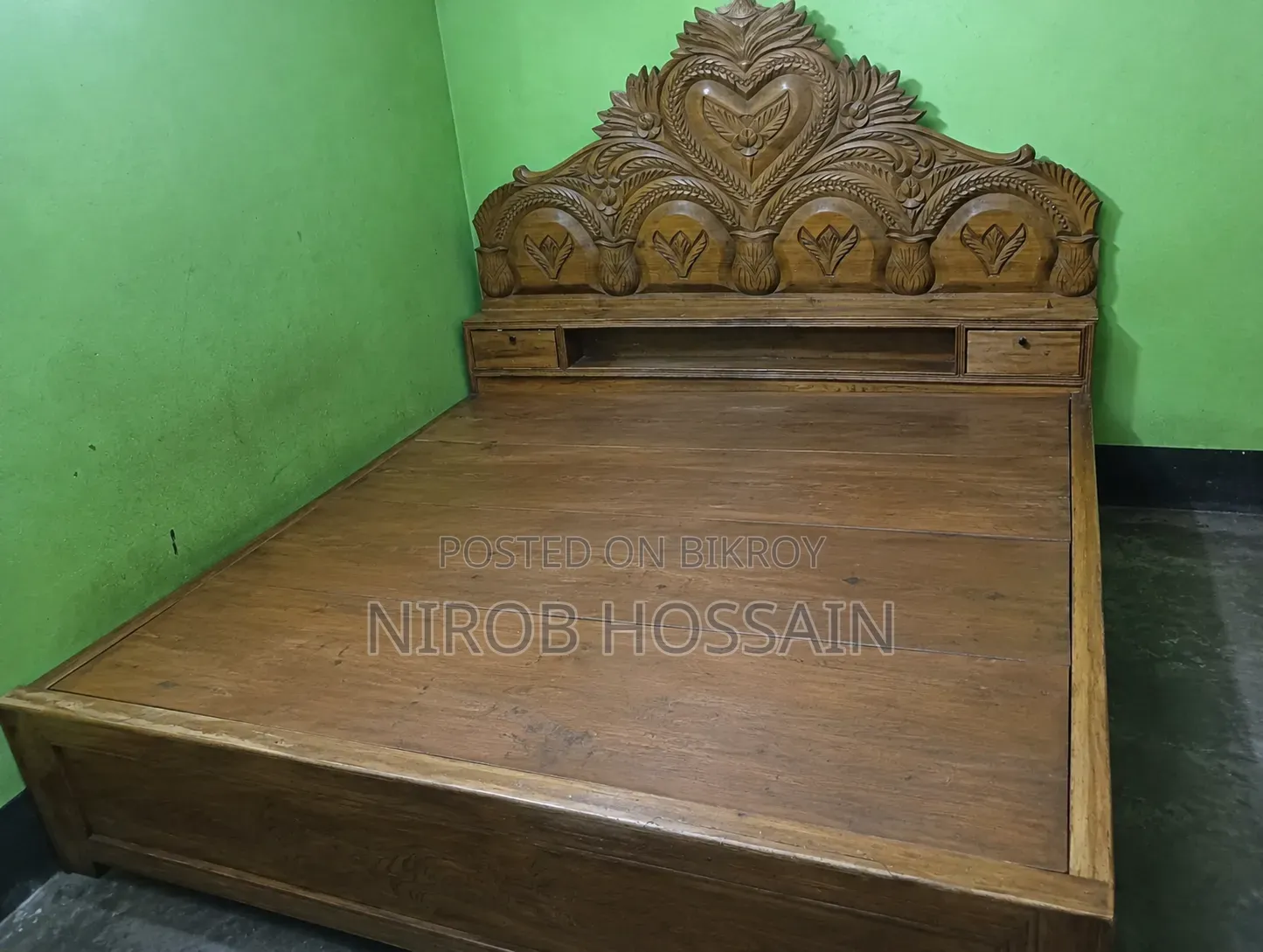 Wooden 6 feet by 7 feet bed