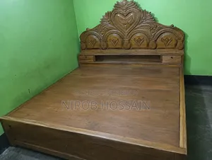 Wooden 6 feet by 7 feet bed