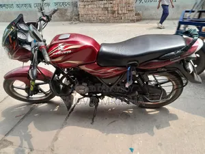 বাজাজ ডিসকভার ১০০ ২০১৫ লাল