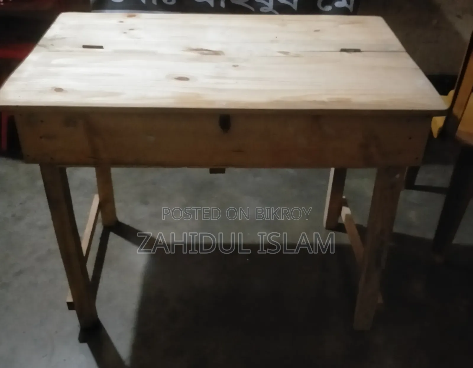 A wooden table and an RFL chair will be sold.