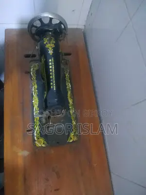 A Treadle Sewing Machine for Sale.