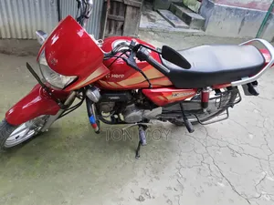 হিরো এইচএফ ডিলাক্স টিউবলেস রিফ্রেশ ২০২৩ অরেঞ্জ