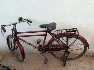 An old red bicycle will be sold.