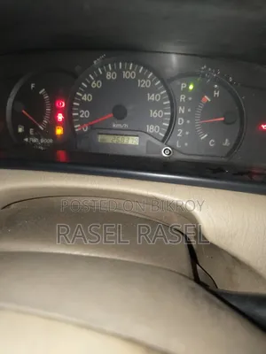 টয়োটা করোল্লা ব্রেক ২০০৩ সাদা