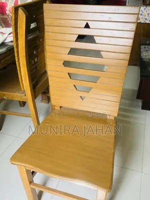 Teak wood dining table.