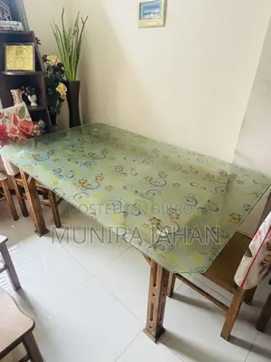 Teak wood dining table.