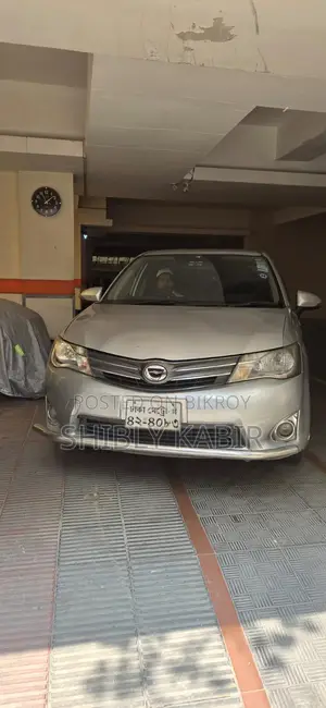 টয়োটা অ্যাক্সিও ২০১৫ সিলভার