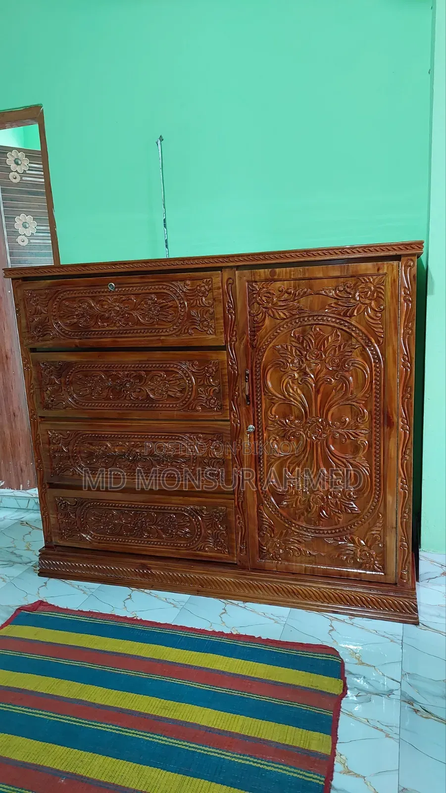 A custom-made 100% solid mahogany wood wardrobe is for sale.