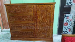 A custom-made 100% solid mahogany wood wardrobe is for sale.