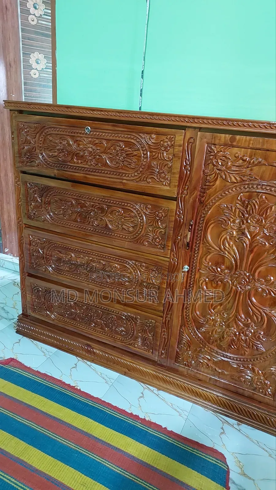 A custom-made 100% solid mahogany wood wardrobe is for sale.