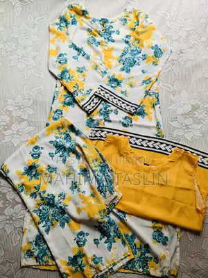 Beautiful yellow and turquoise floral print on white