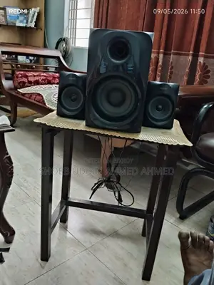 Samsung TV Monitor and Bluetooth Speaker