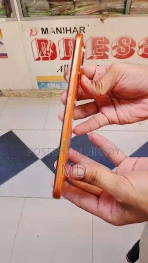ইনফিনিক্স নোট এজ ১২৮ জিবি কমলা
