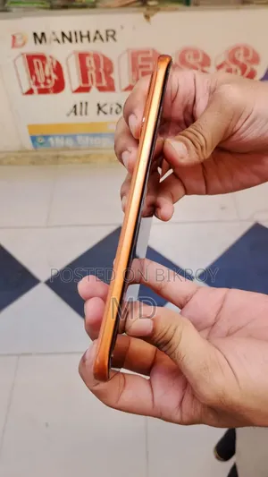 ইনফিনিক্স নোট এজ ১২৮ জিবি কমলা