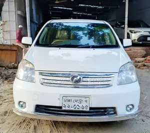 টয়োটা রাউম ২০০৯ হোয়াইট