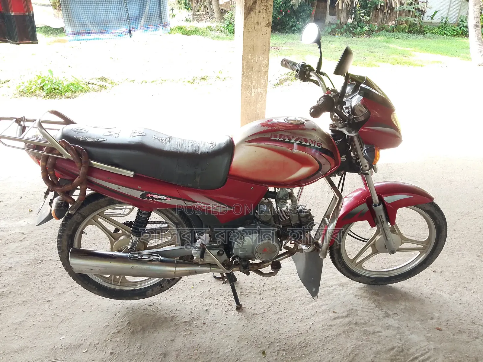 দায়াং ডিওয়াই১০০-এ ২০০৯ লাল