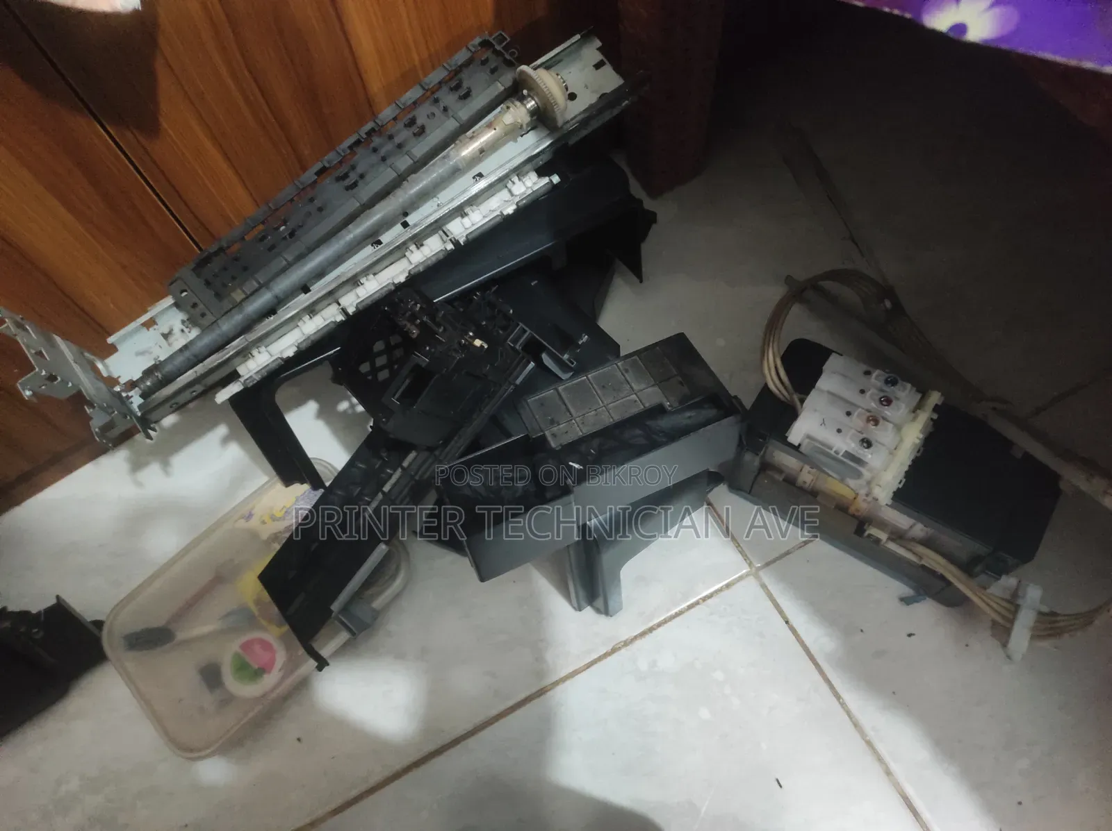 লোকেশনে গিয়ে কালার প্রিন্টার সার্ভিসিং করা হয়...