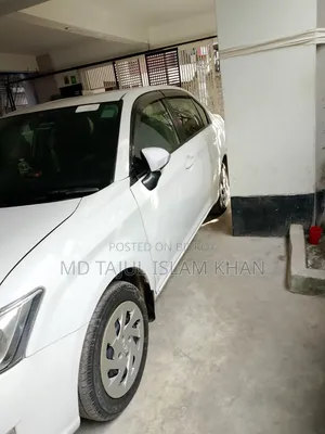 টয়োটা এক্সিও ২০১২ সাদা