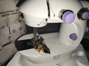 Mini sewing machine for sale